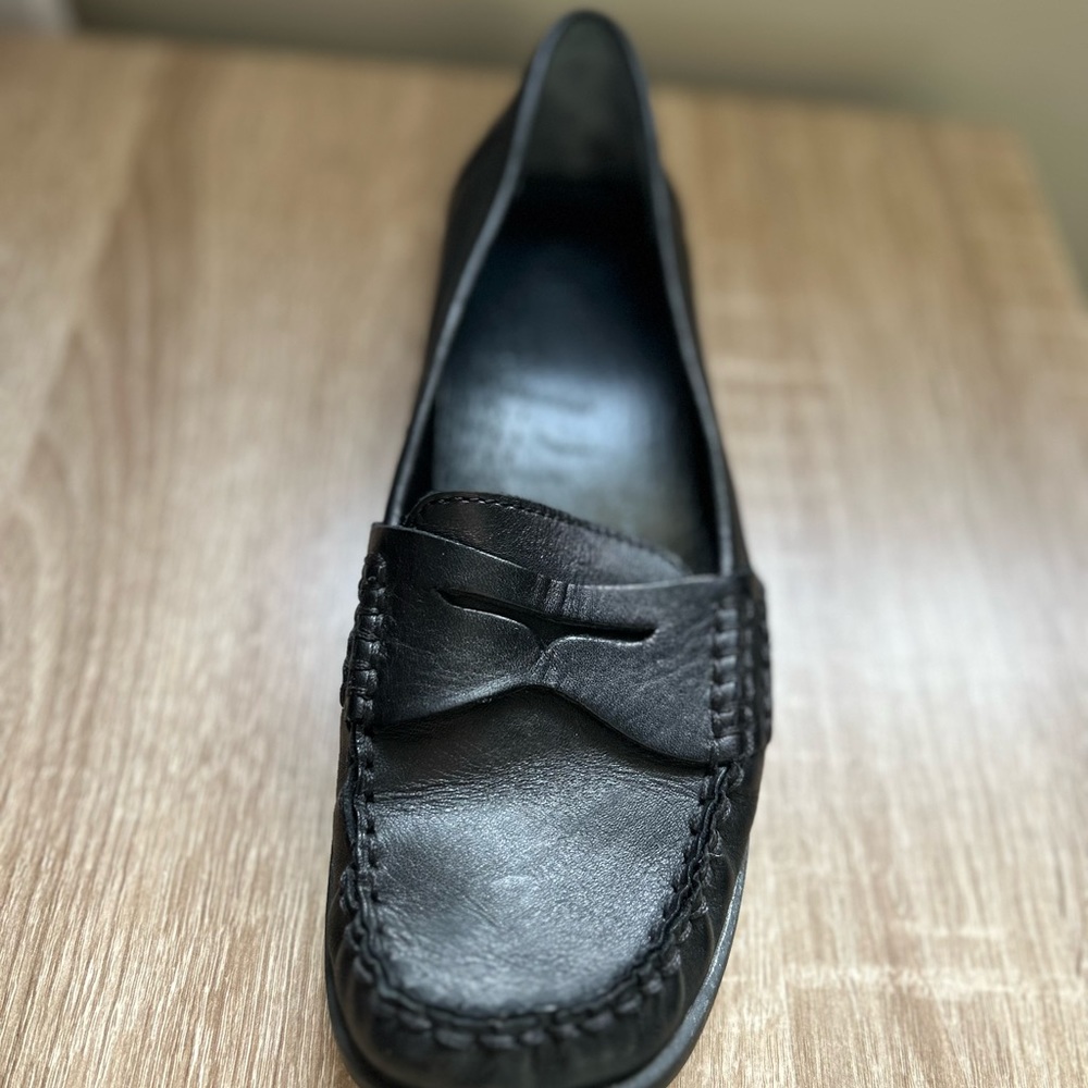Boss black leather loafers.